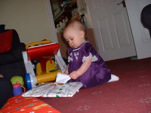 Opening the first Christmas present