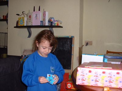 Opening a little present first